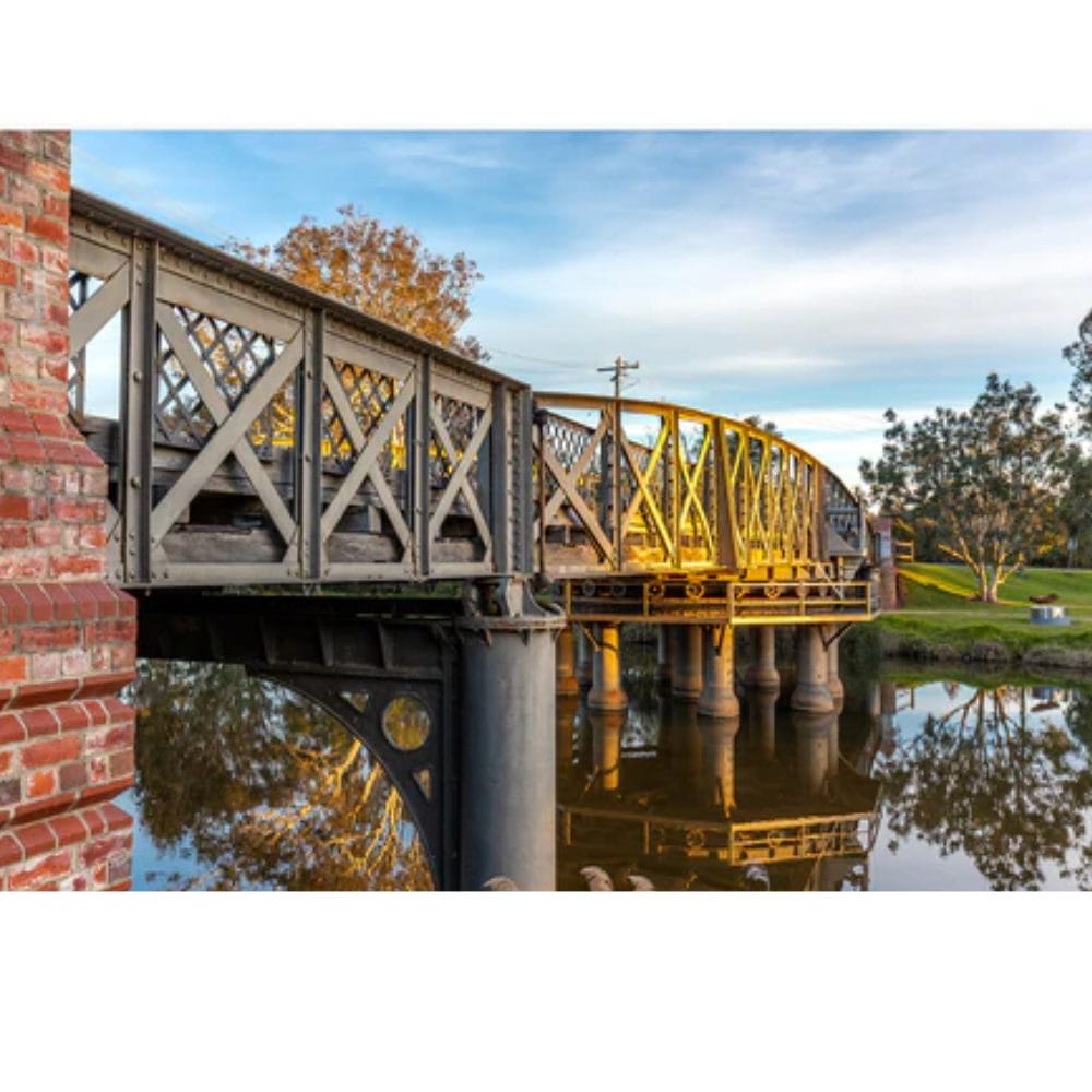 Lotje McDonald 1000 Piece Jigsaw Puzzle – Sale Historic Swingbridge Sunset