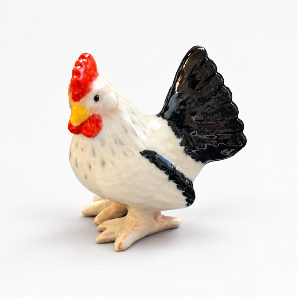 TMT Imports black and white hen ceramic figurine with red comb